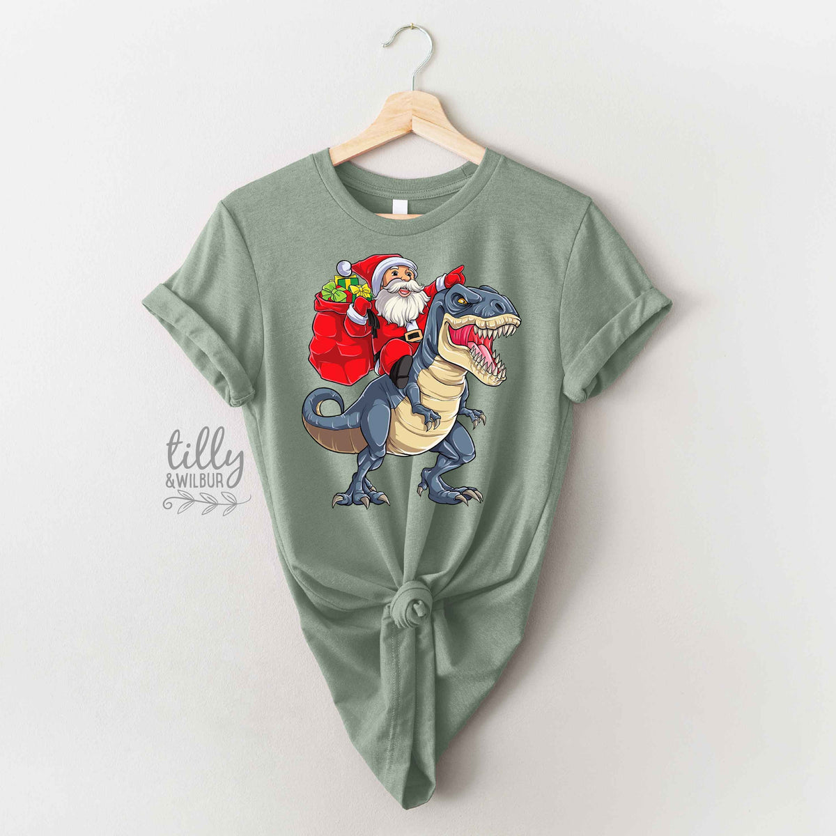 *MORE COLOURS AVAILABLE* Santa Riding Dino Christmas T-Shirt