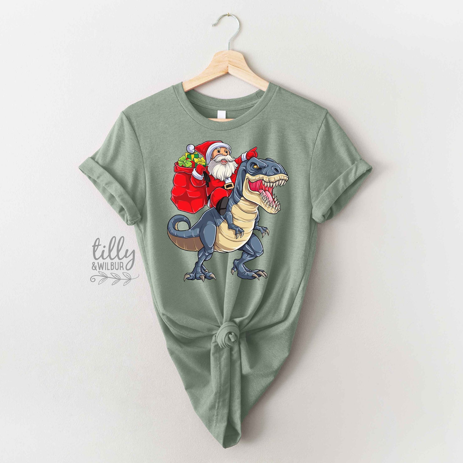 *MORE COLOURS AVAILABLE* Santa Riding Dino Christmas T-Shirt