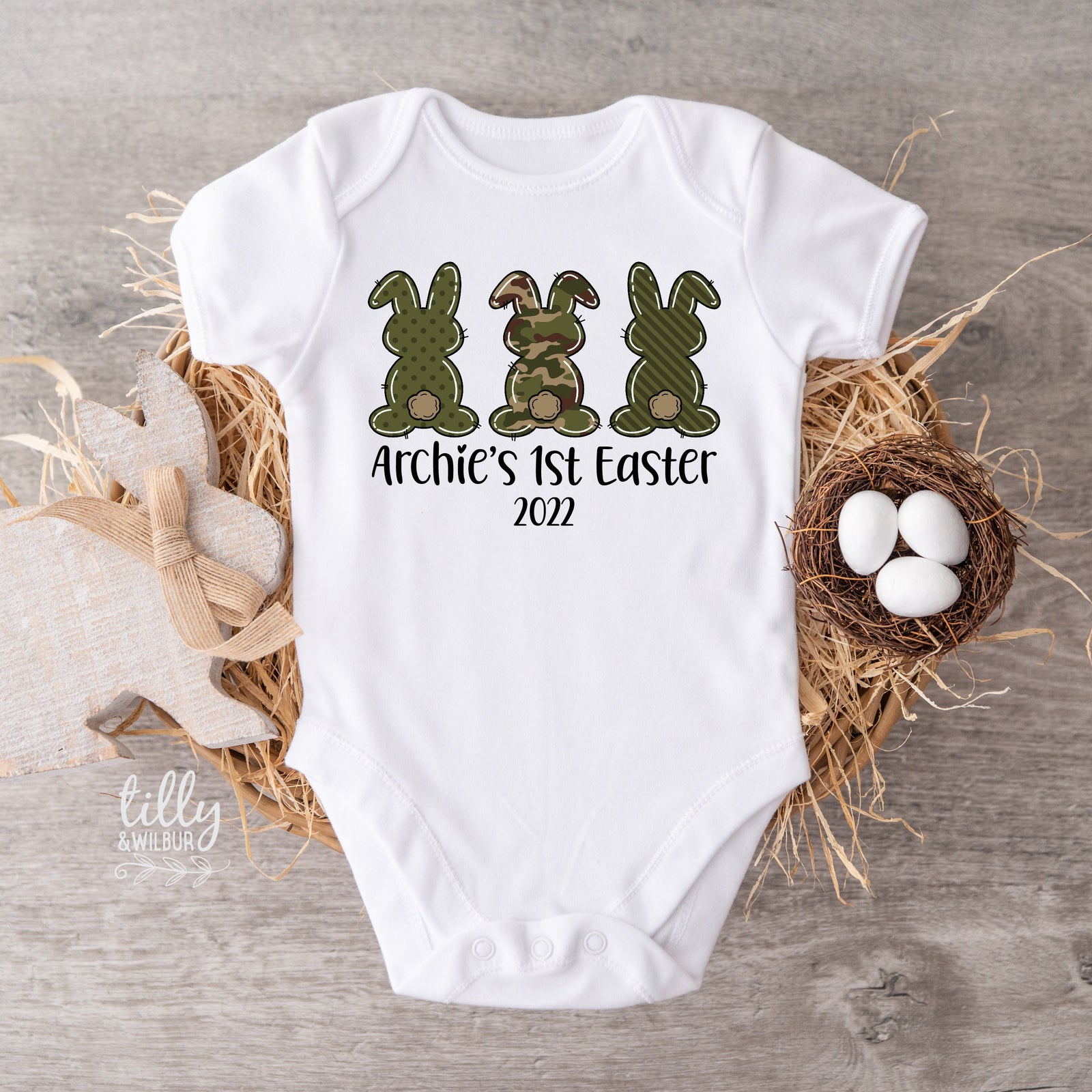 Personalised baby bodysuit with camo bunny design and custom name and year for first Easter
