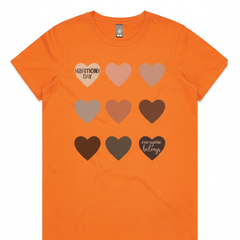 White t-shirt with heart-shaped designs and text on a white background